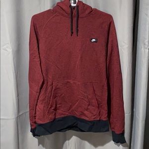 Red and black hooded Nike sweatshirt